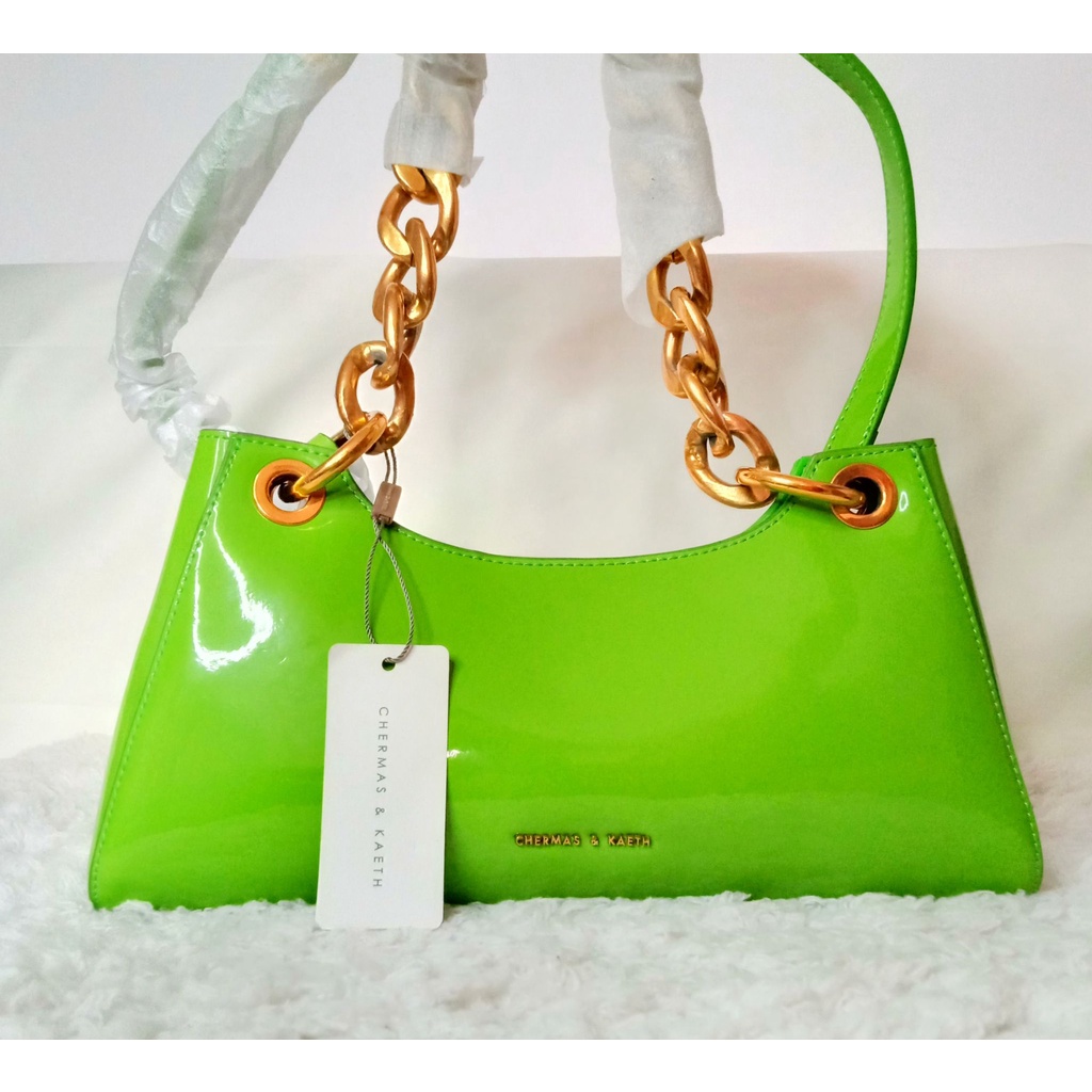 BRANDNEW AESTHETIC GREEN BAG WITH GOLD HANDLE CHERMAS AND KAETH