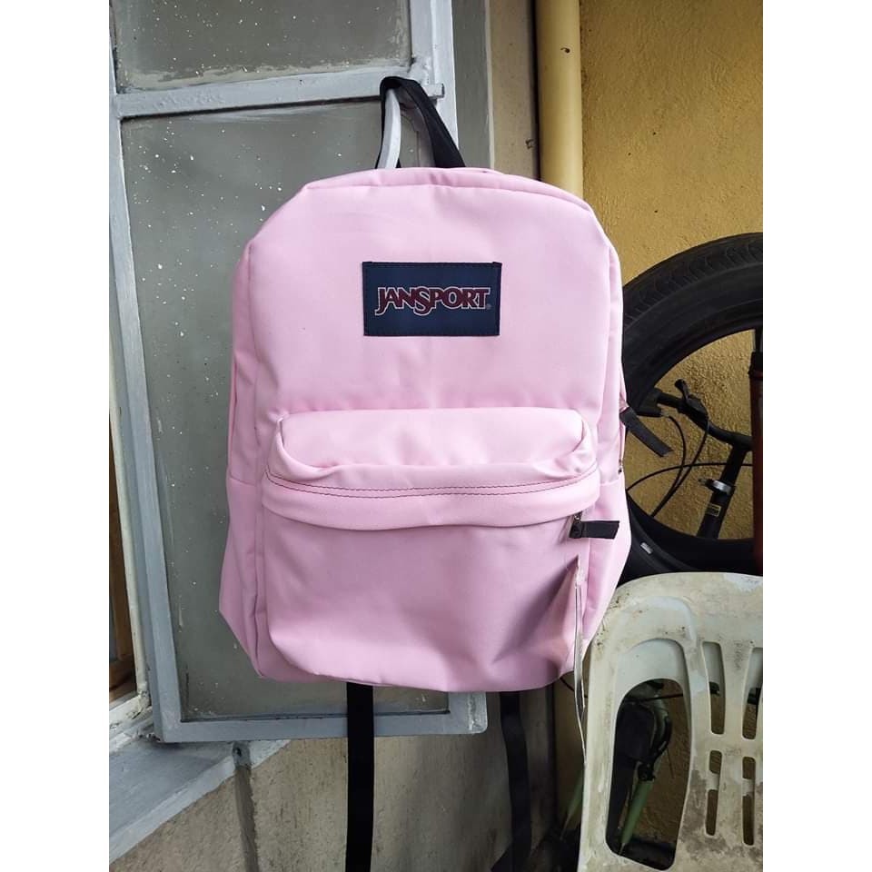 baby pink jansport backpack