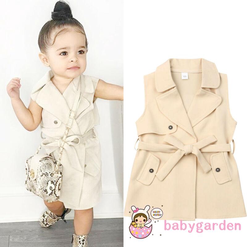 baby in trench coat