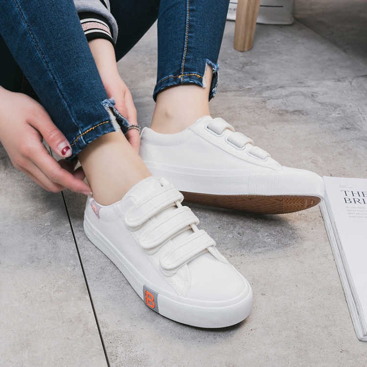 white canvas velcro shoes