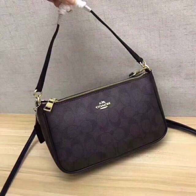 coach 2 way sling bag