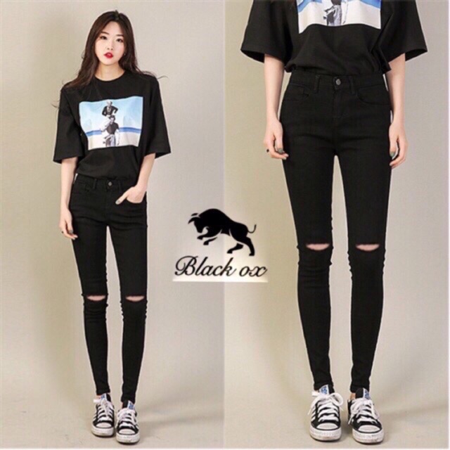 low rise black ripped jeans