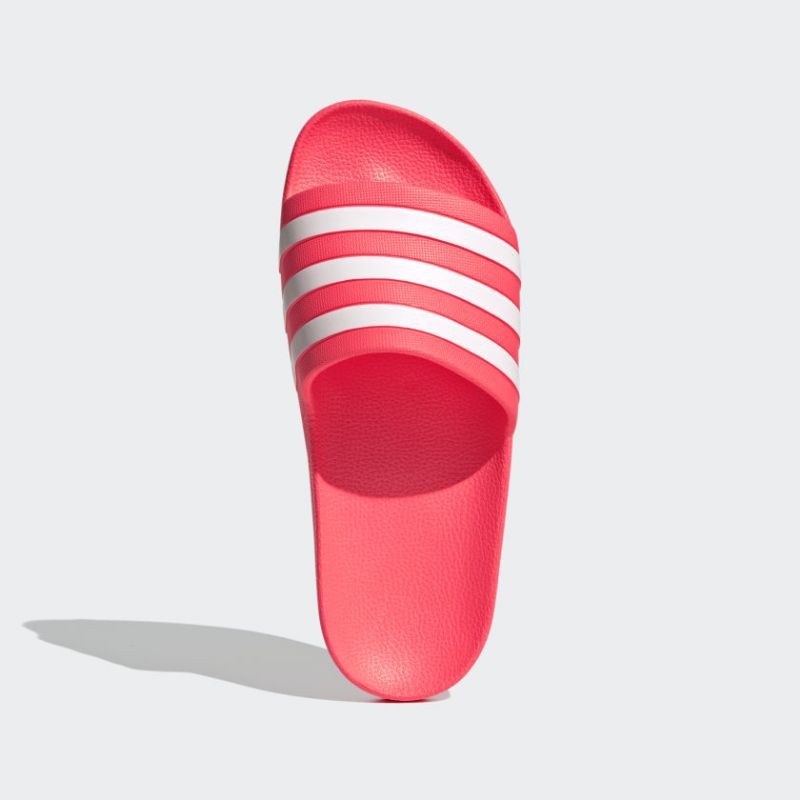 red and pink adidas slides