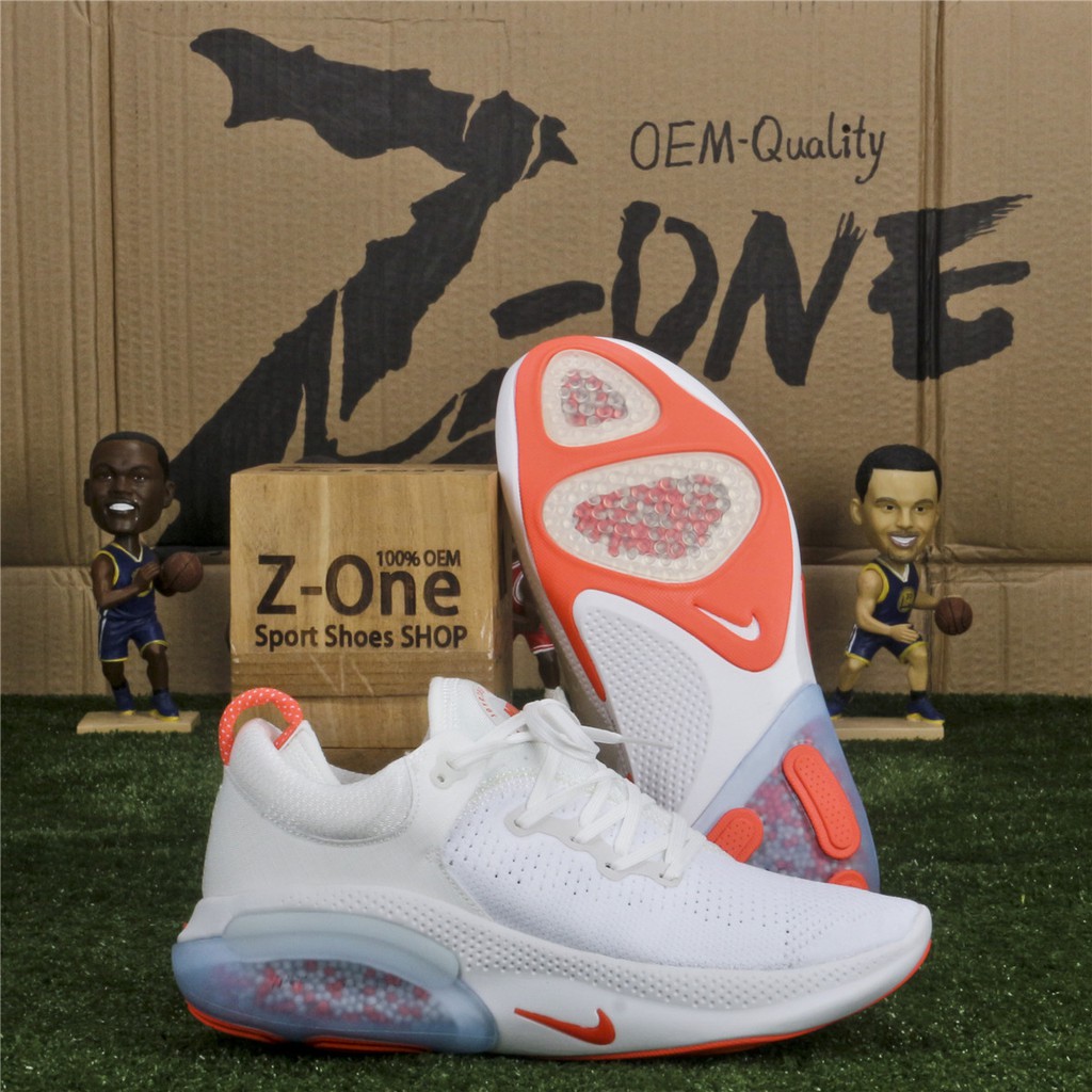 nike joyride white orange