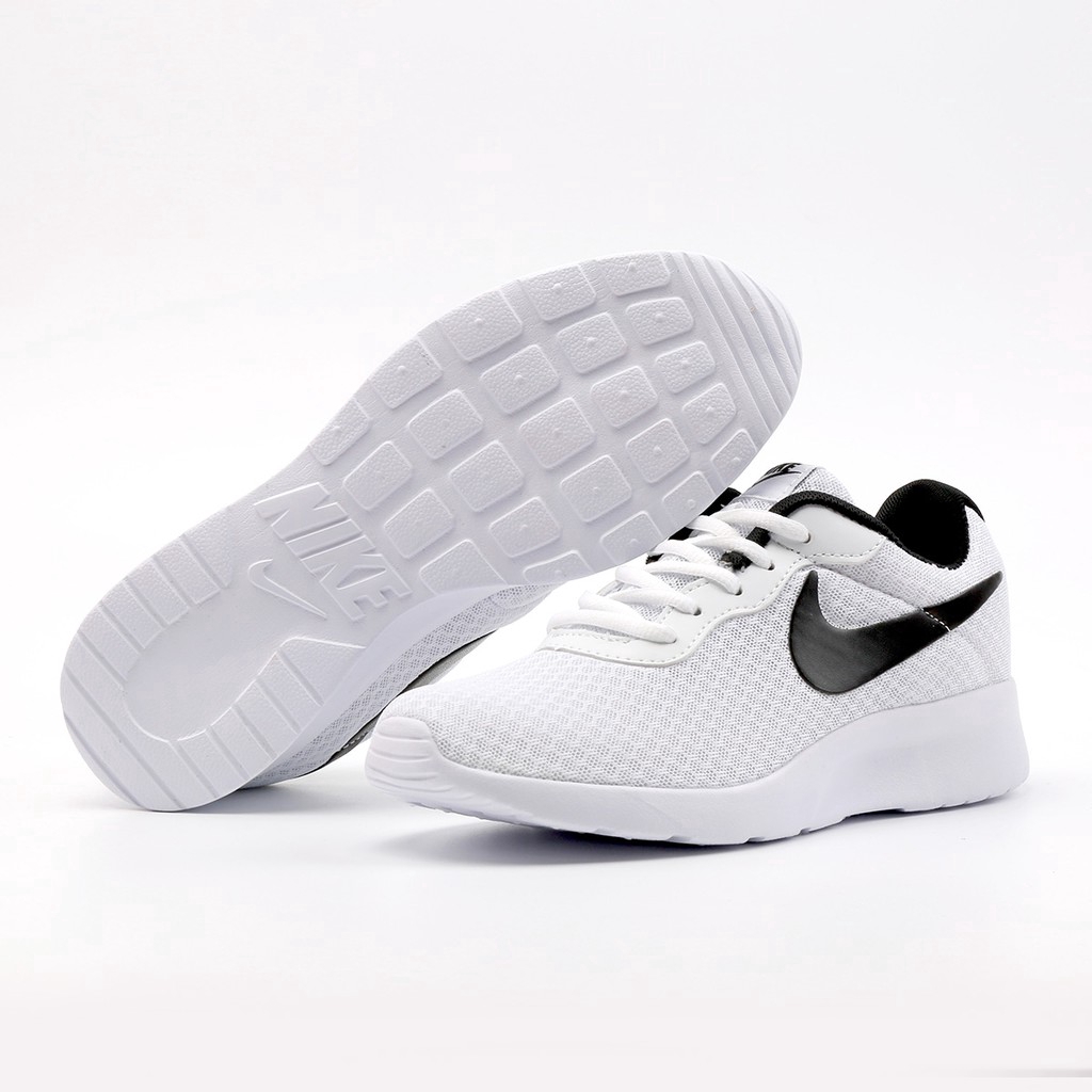 nike roshe black run
