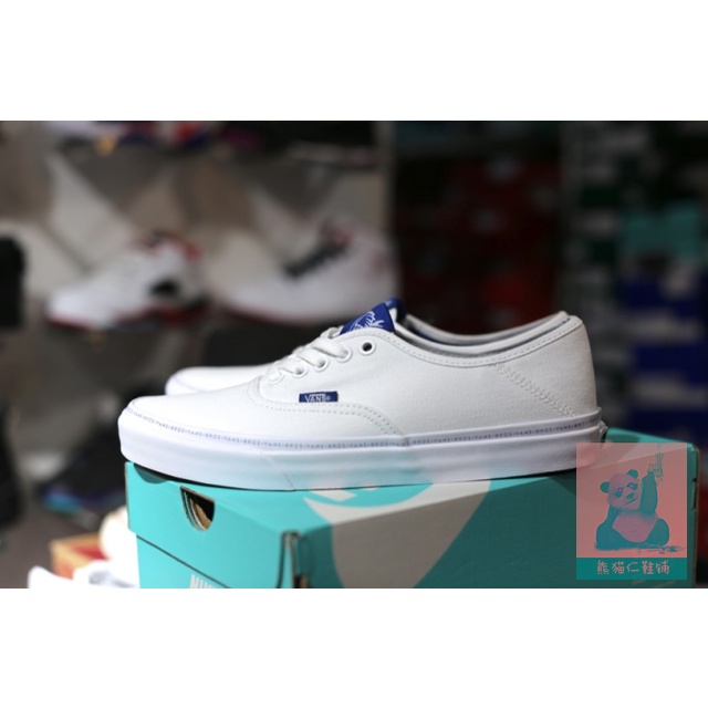 white rainbow bottom vans