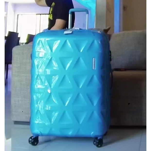 light blue samsonite luggage