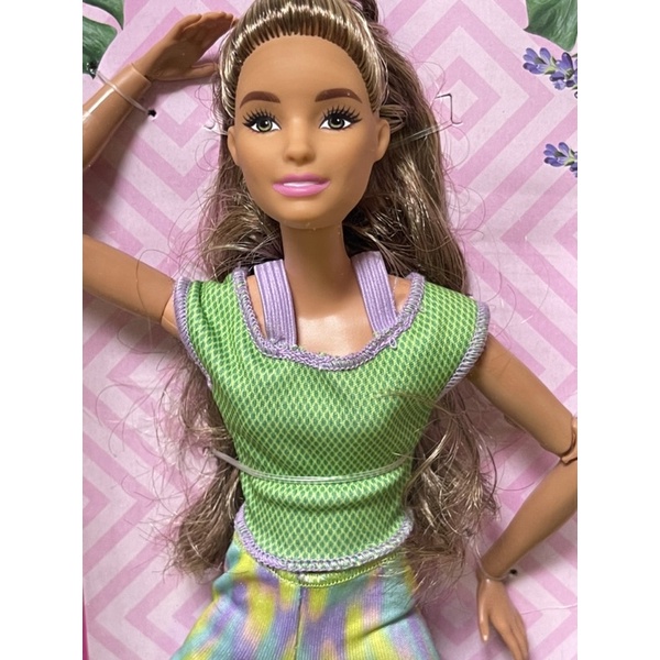 green top made to move barbie