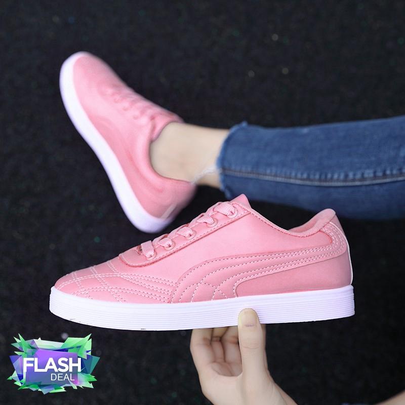 pink white and black pumas