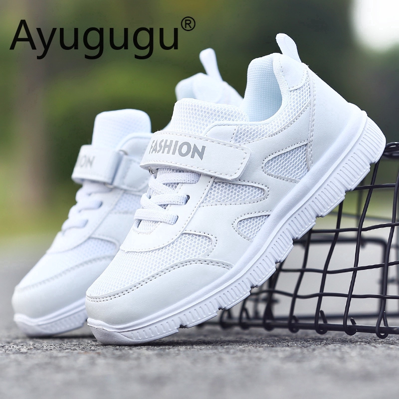 white sport shoes kids