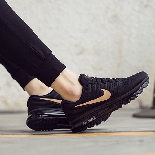 nike black and gold shoes