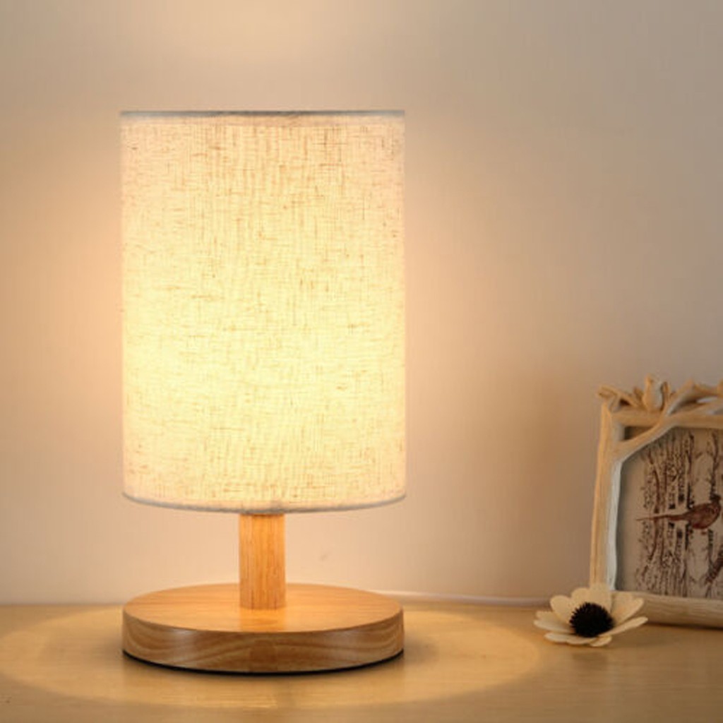 white and wood table lamp
