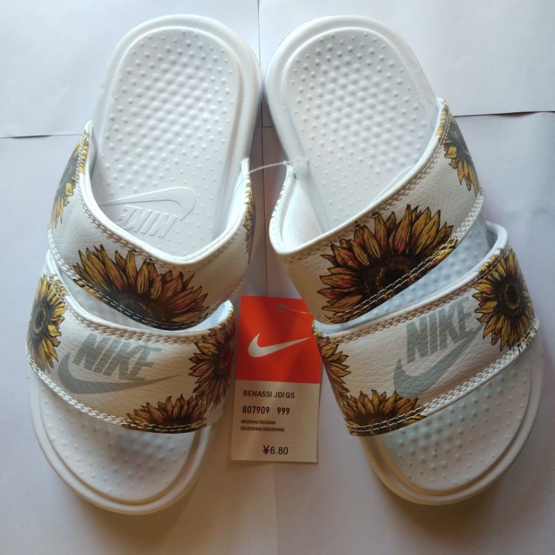 white nike sunflower sandals