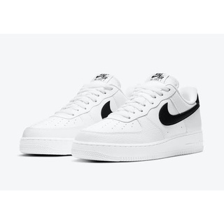 white airforces with black tick