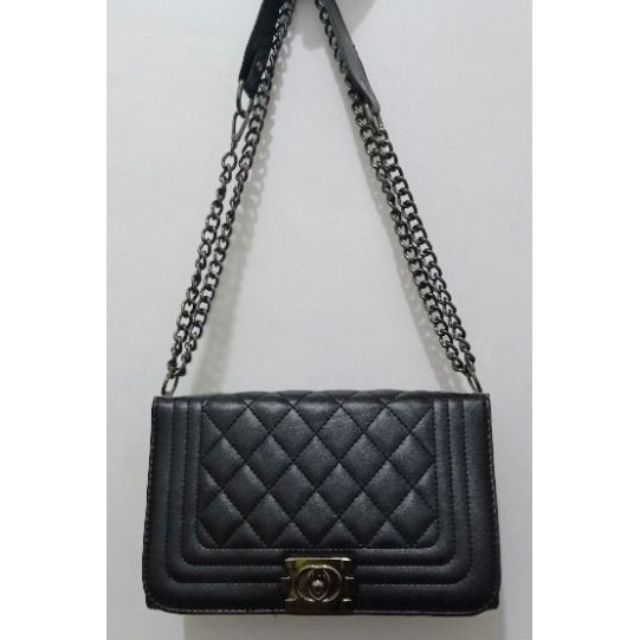 black sling bag with chain