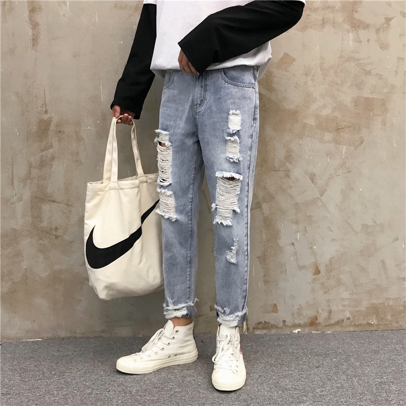 tattered bottom jeans