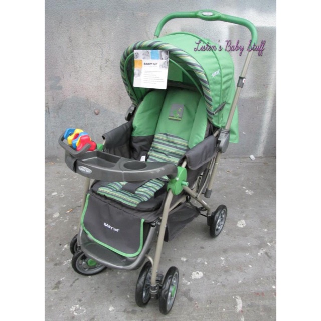 green baby stroller