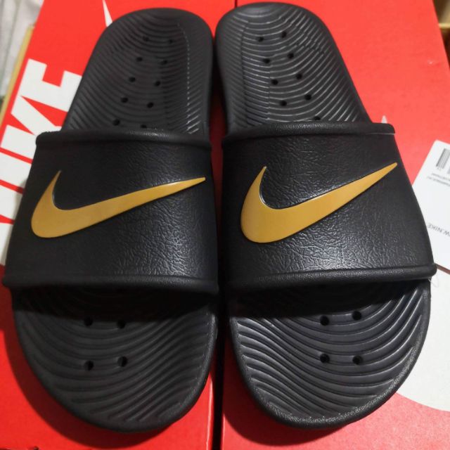 nike kawa slides black and gold