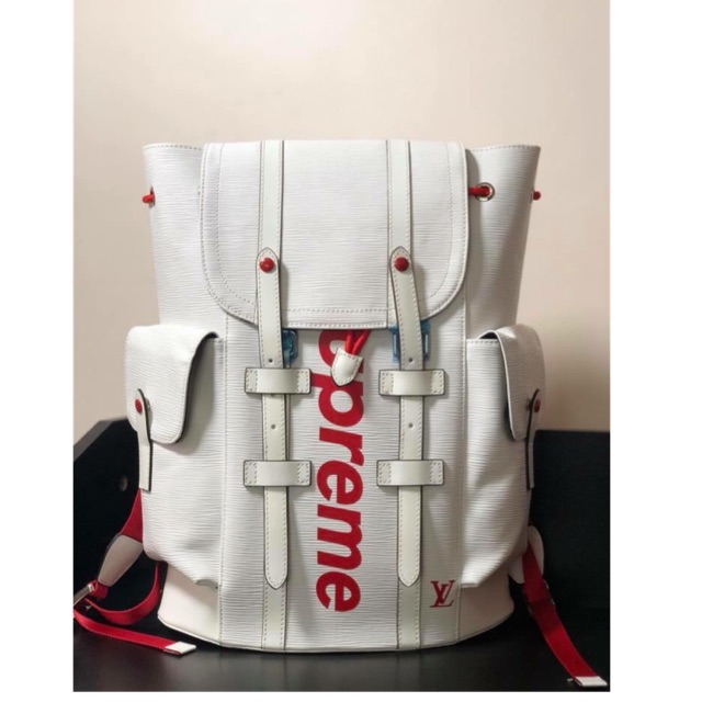 lv and supreme backpack