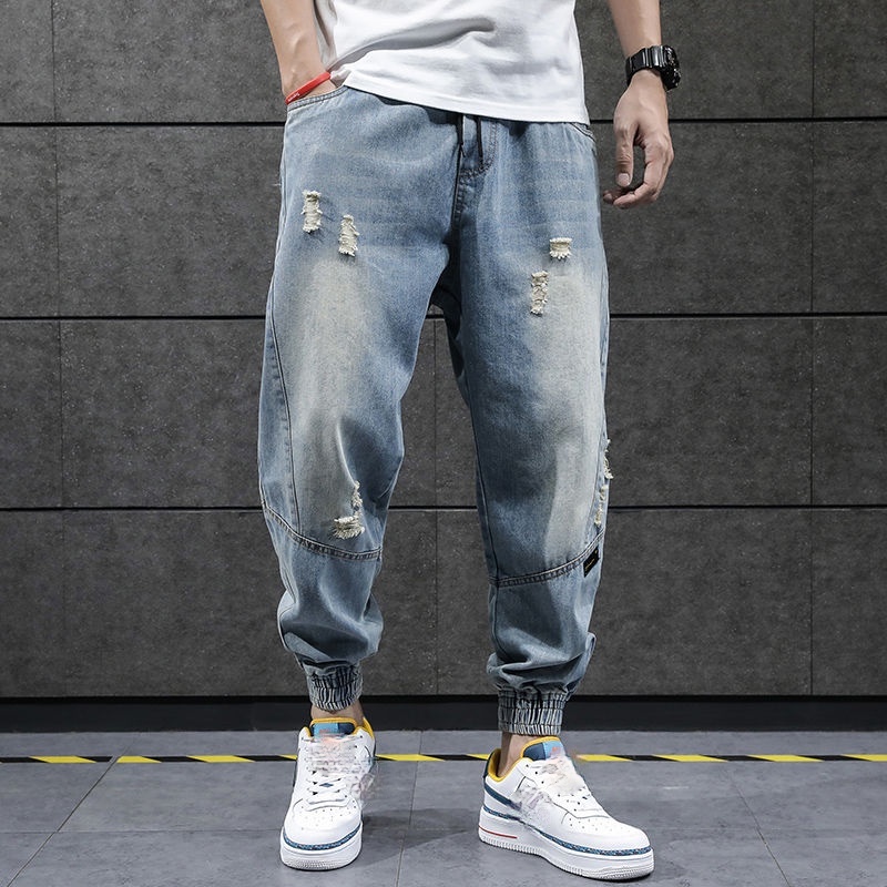 torn jogger jeans