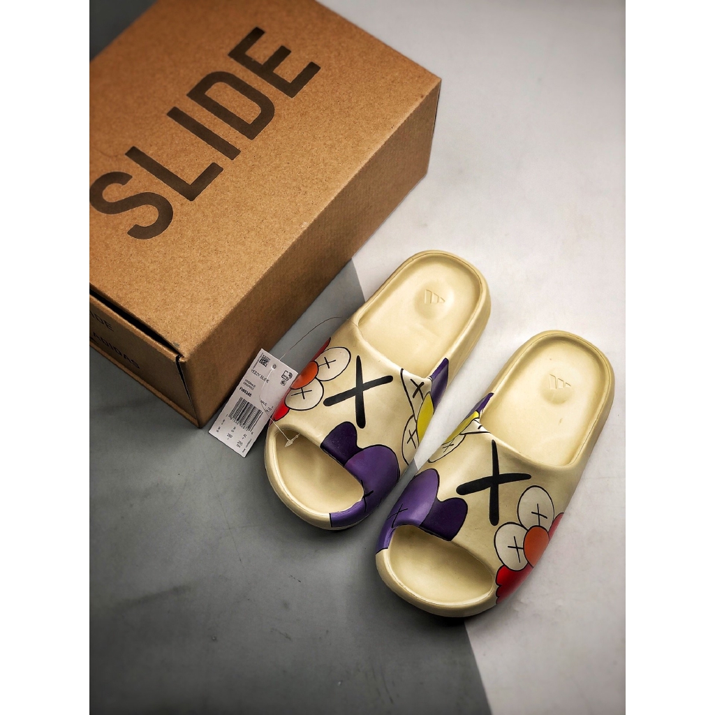 yeezy slide x kaws
