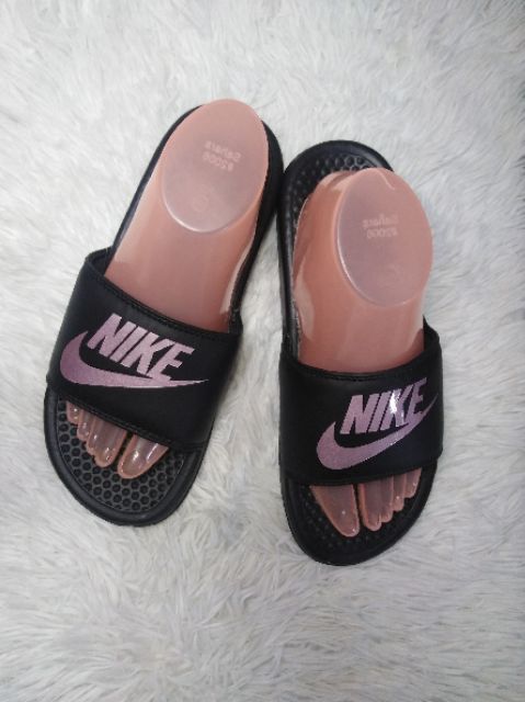 rose gold and black nike slides