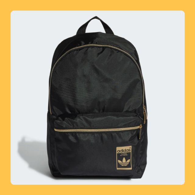 gold and black adidas backpack