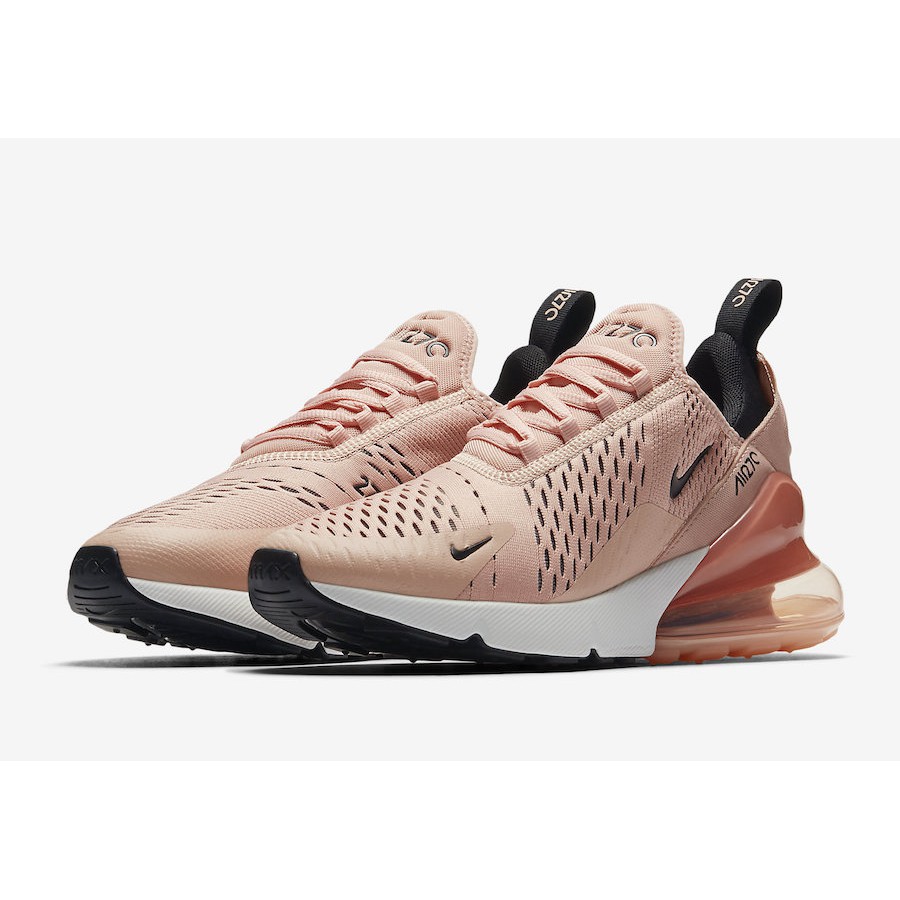 salmon colored nike shoes