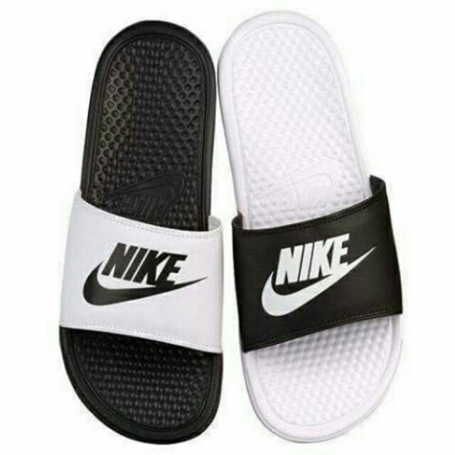 black and white mismatch nike slides