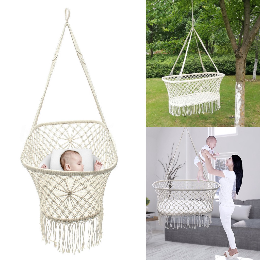 baby sleeping in swing chair