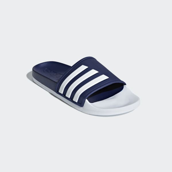 blue and white adidas slides