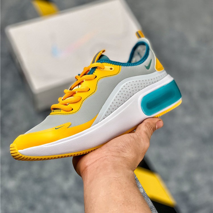 nike grey and yellow