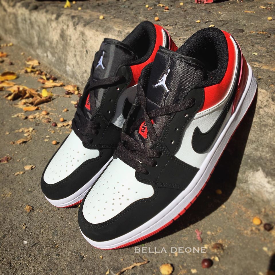 jordan 1 low black toe women