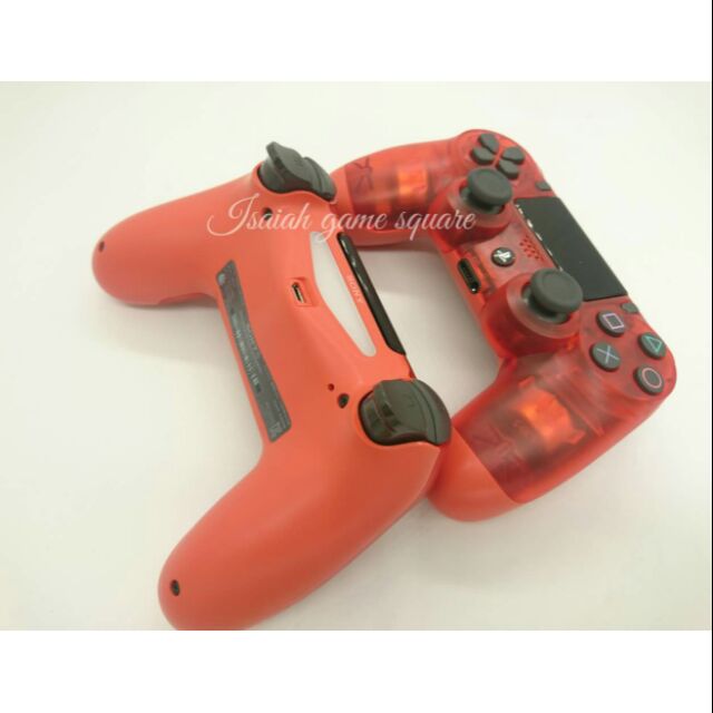 red dualshock 4 controller