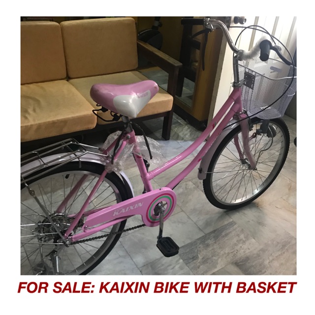 ladies pink bike with basket