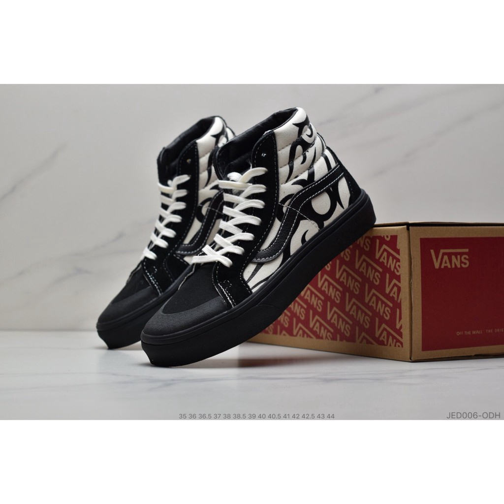 vans high top black shoes