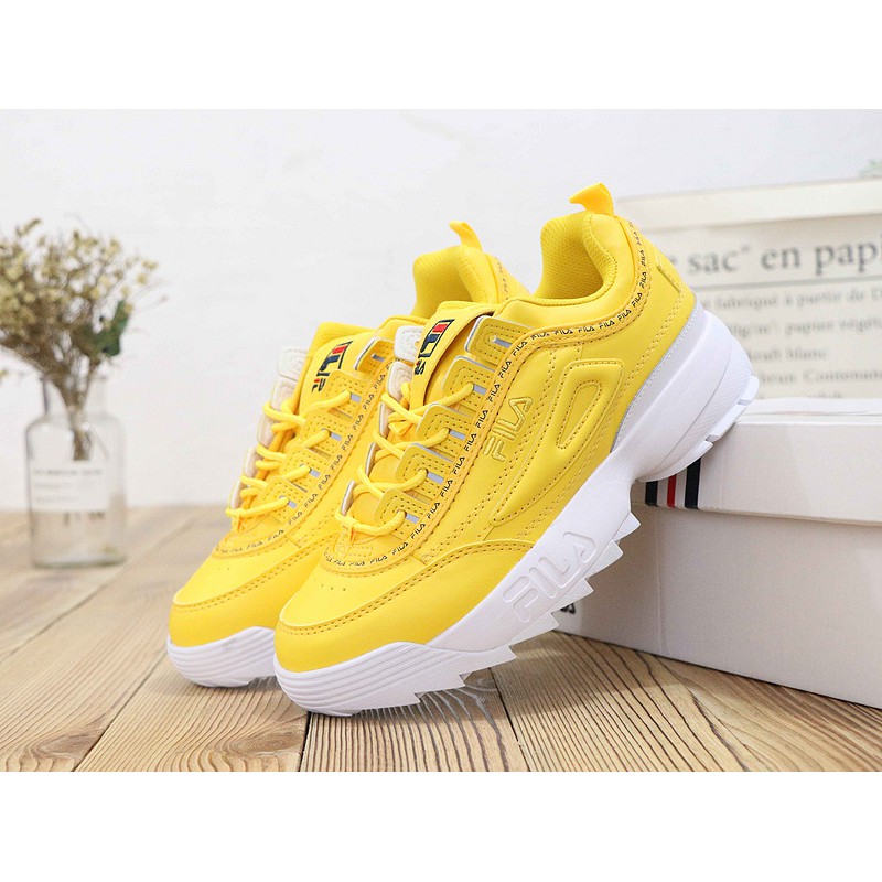 yellow fila shoes