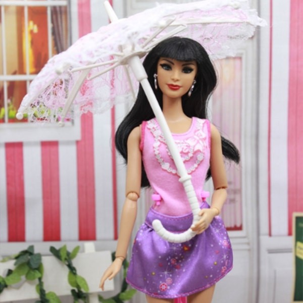 barbie doll with umbrella