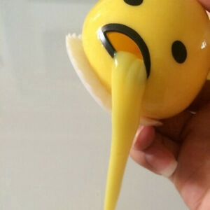 squishy puking egg yolk stress ball