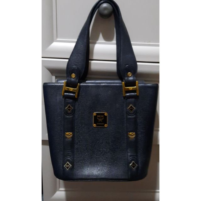 black and gold mcm bag