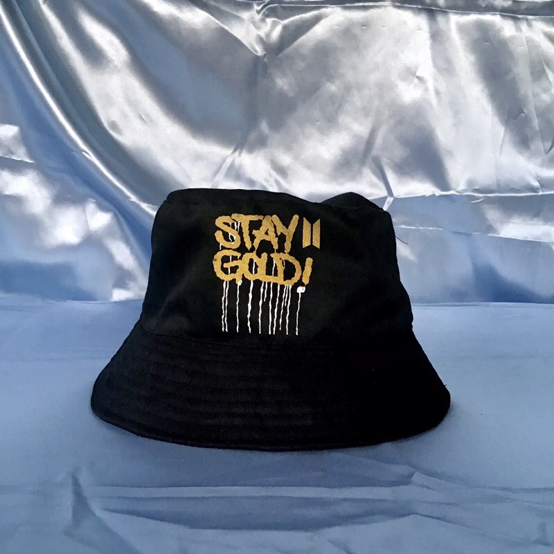 black and gold bucket hat