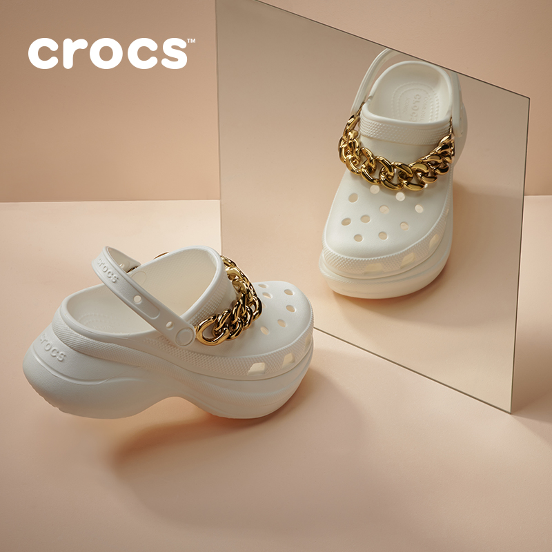 crocs white with chain