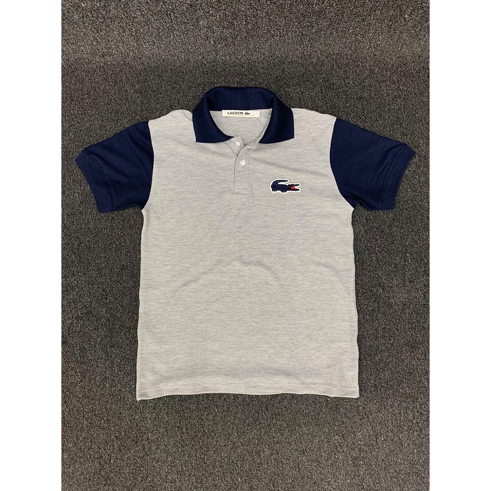 dark blue lacoste polo shirt