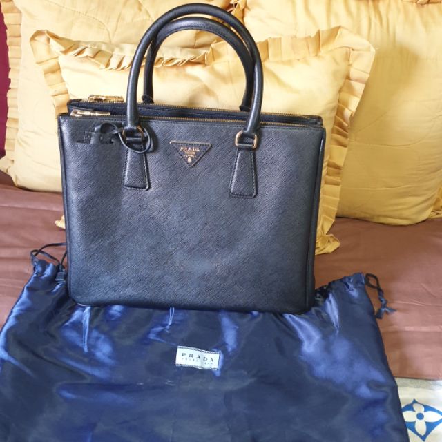 Preloved Prada two way bag with lampo zipper and serial number. | Shopee  Philippines