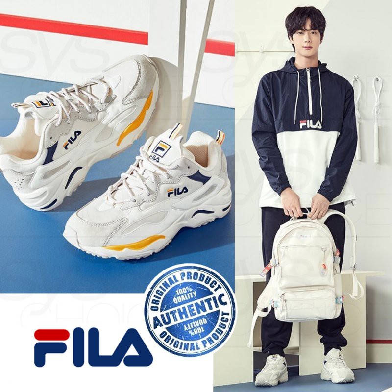 blue and yellow fila shoes