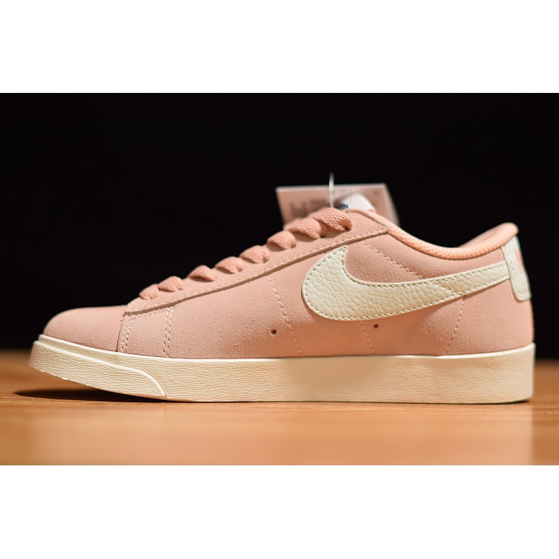 peach color nike shoes