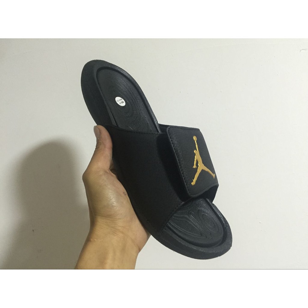 gold nike flip flops