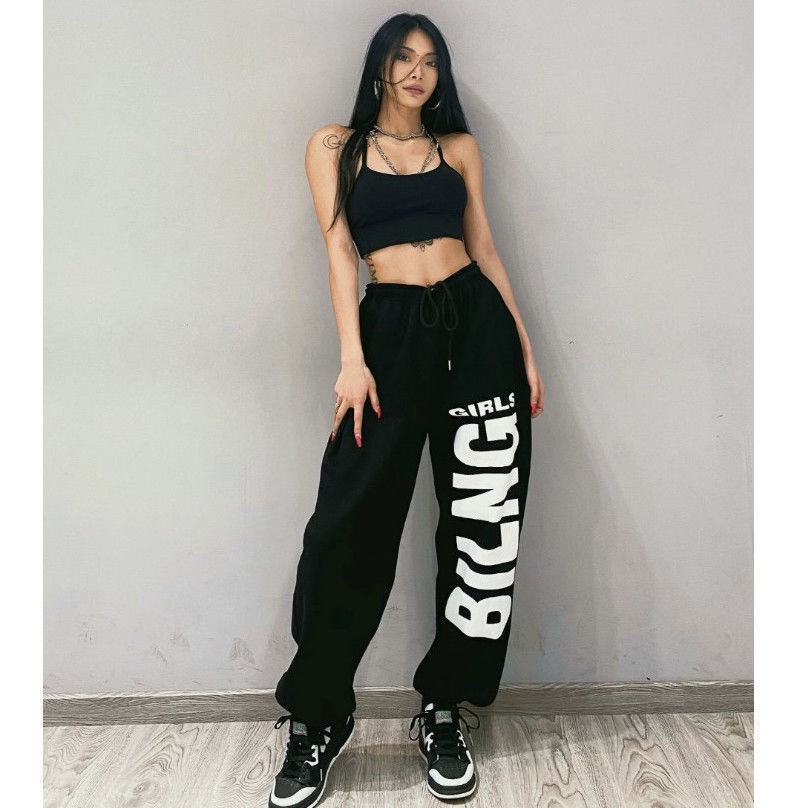 black sweatpants with designs