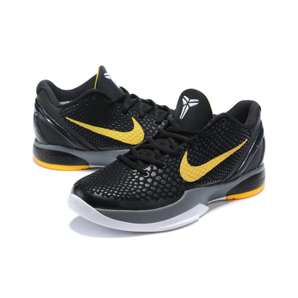 kobe black yellow shoes