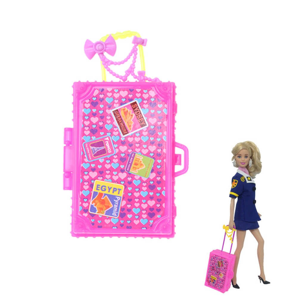 barbie with luggage